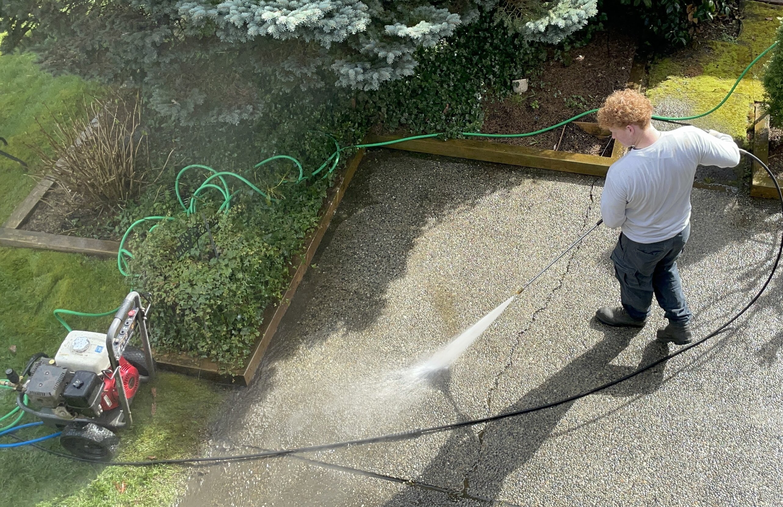 Powerhouse Pressure Washing crew washing a townhouse exterior in Walnut Grove, Langley