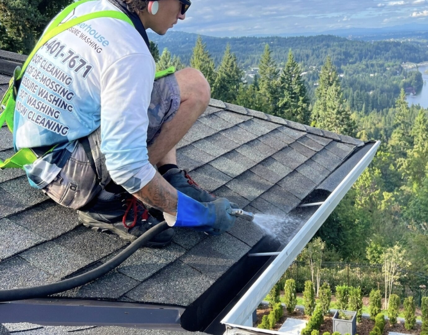 Soft wash reaching the upper floors and roofline of a 3-story Langley townhouse